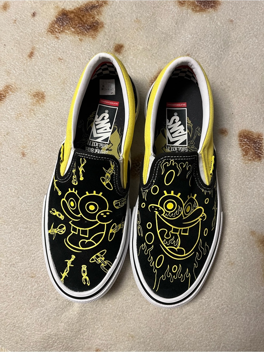 Vans Black & Yellow Slip-On Sneakers with Cartoon Graphics